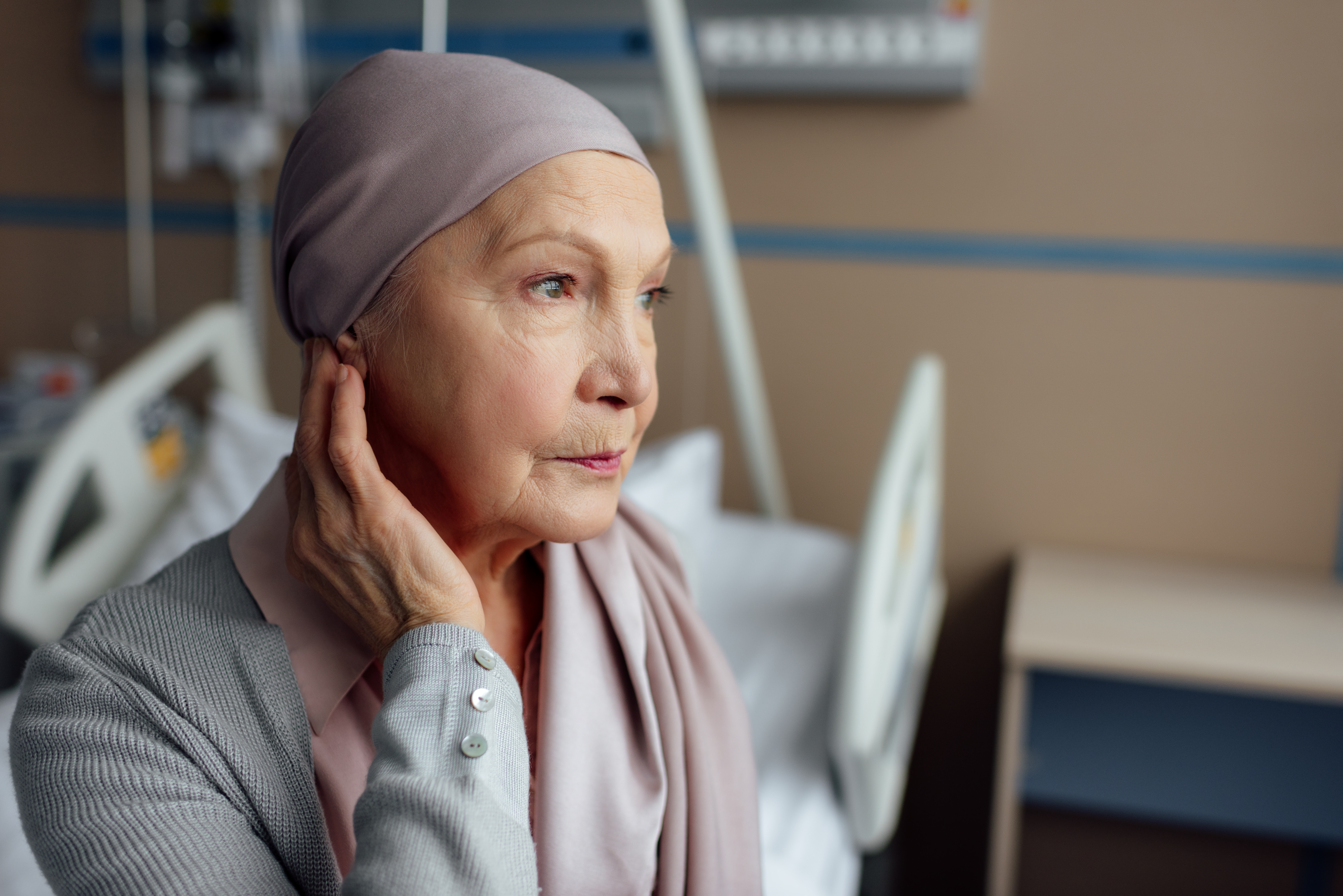 An older woman resting during cancer treatment