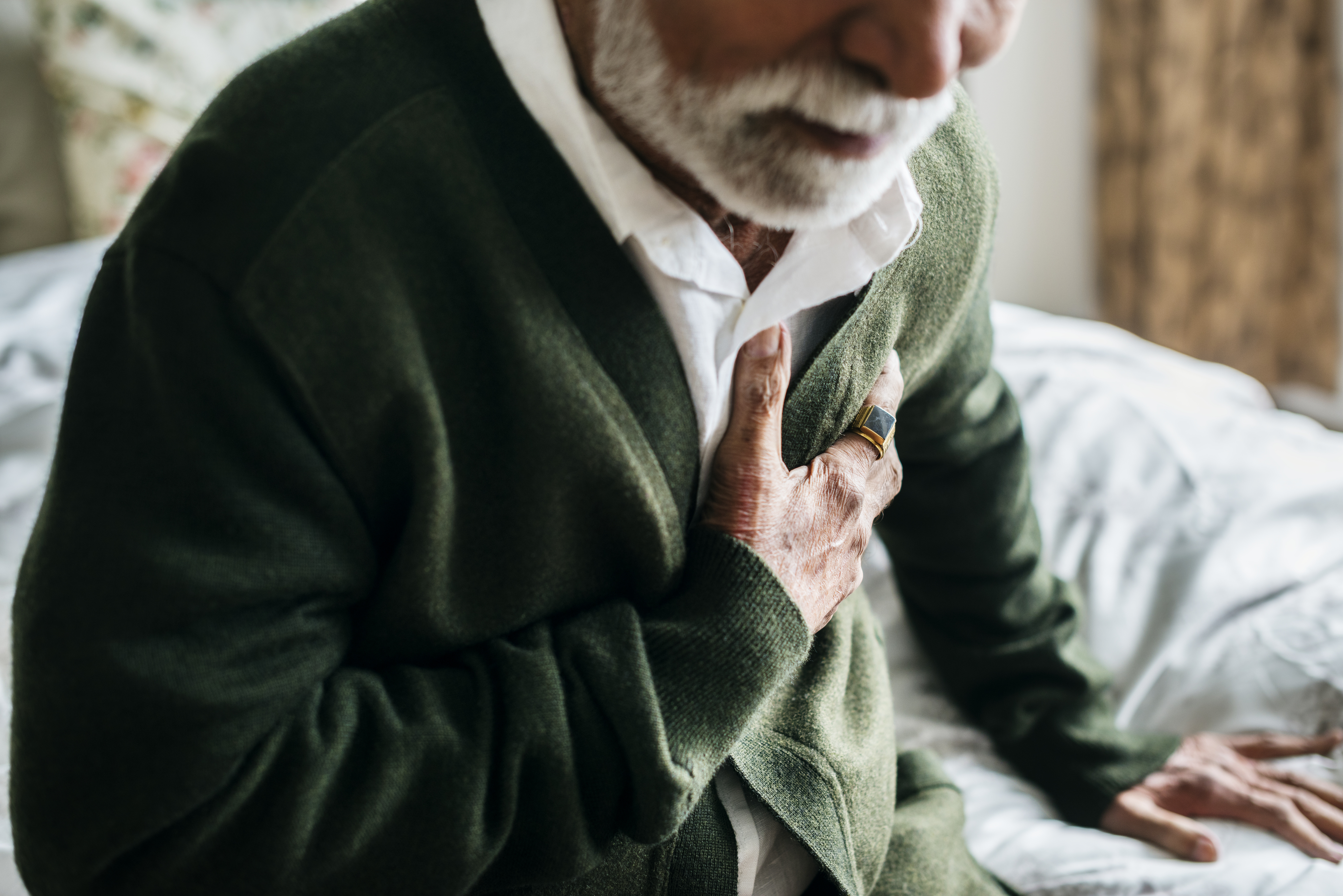 An older woman and professional carer sharing time together at home
